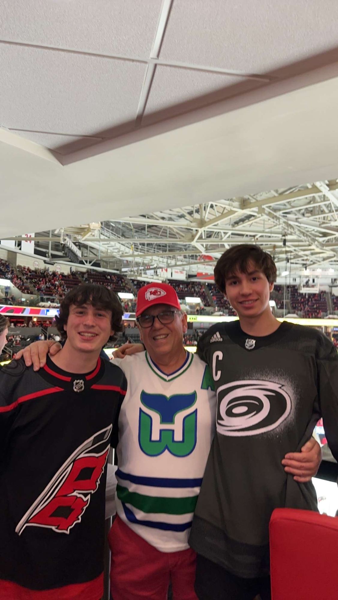 Seahawk Appliances owner with family at a hockey game