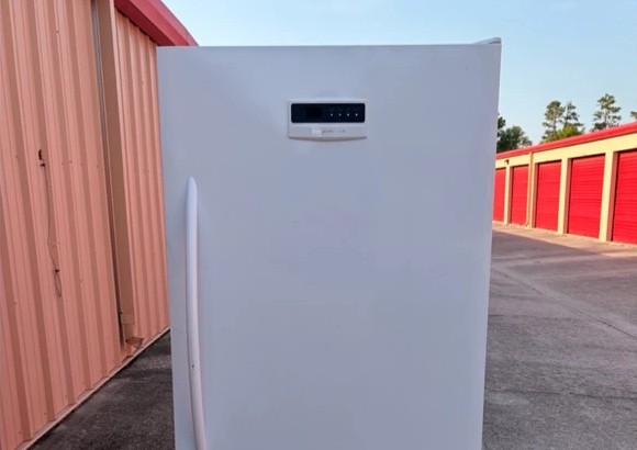 Frigidaire upright freezer in the warehouse